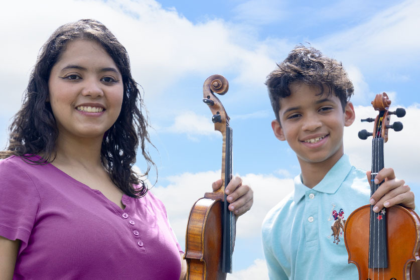 Leyra and Zavyer, each born with hydrocephalus